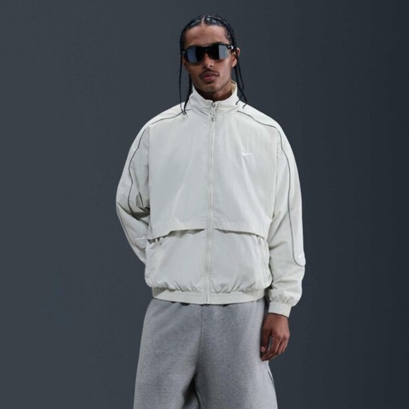 Nike Solo Swoosh Track Jacket in Light Bone/White - Picture 1 of 9
